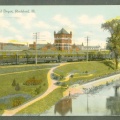 Another vintage postcard showing the train depot from the wire rope bridge on the Tinker property.
